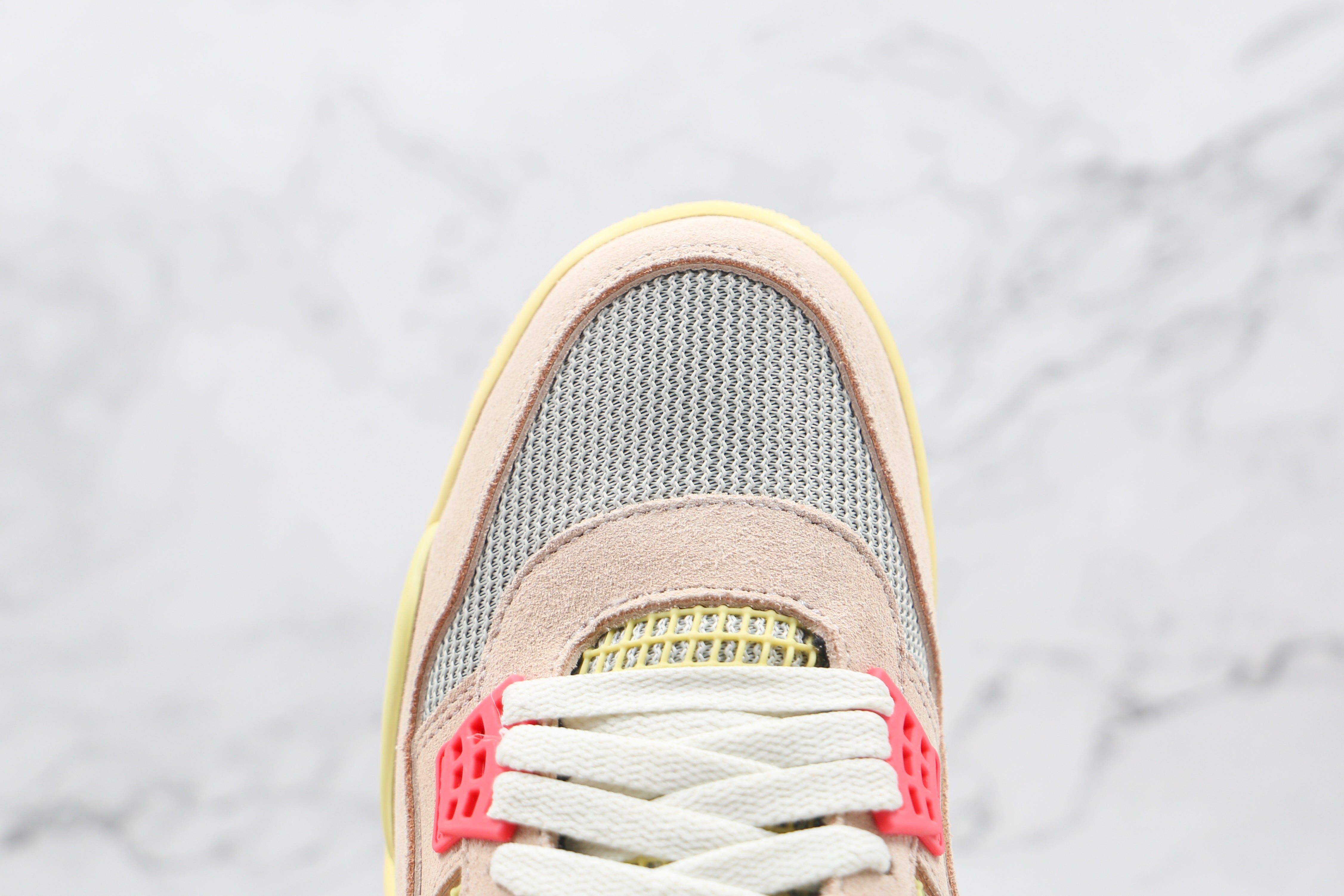 Jordan 4 Retro Union Guava Ice